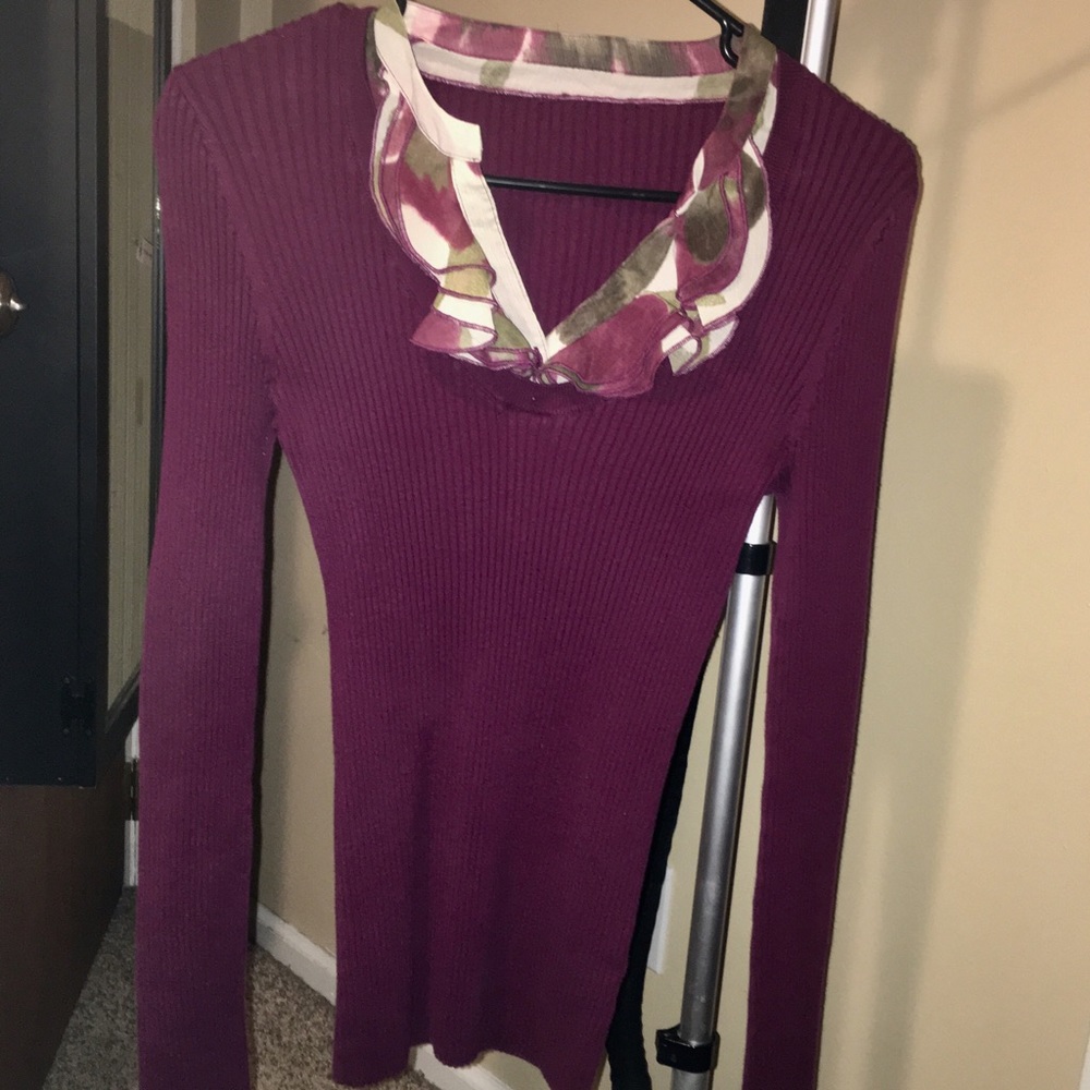 Size medium ( tag no longer in the shirt )
